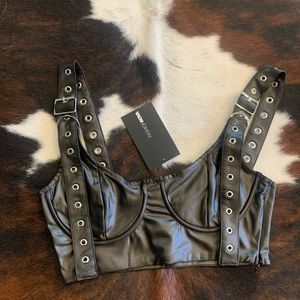 Black faux leather buckle crop top
